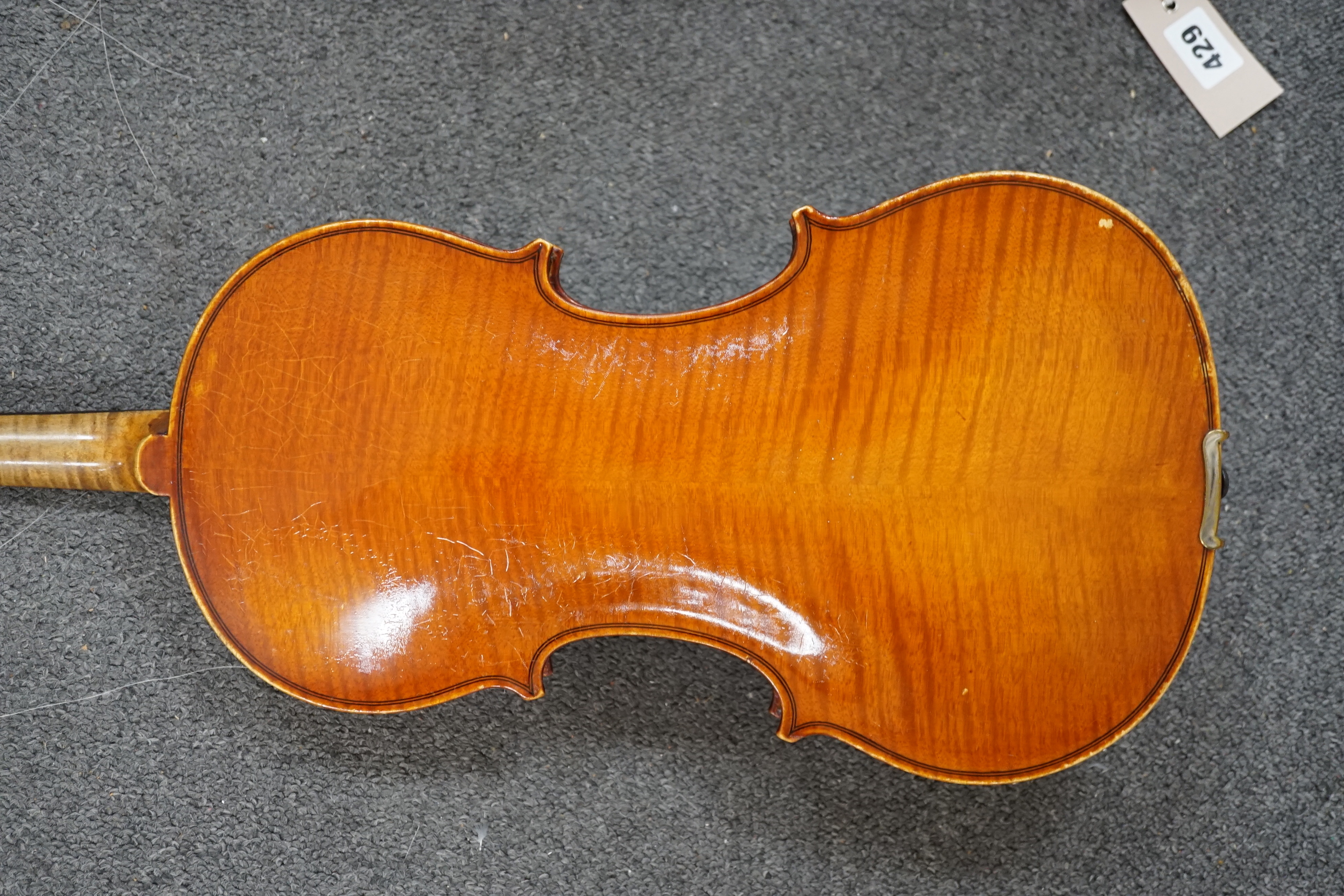 A 19th century violin with silver mounted bow and case, back measures 36cm CITES Submission reference JX7RJU7S